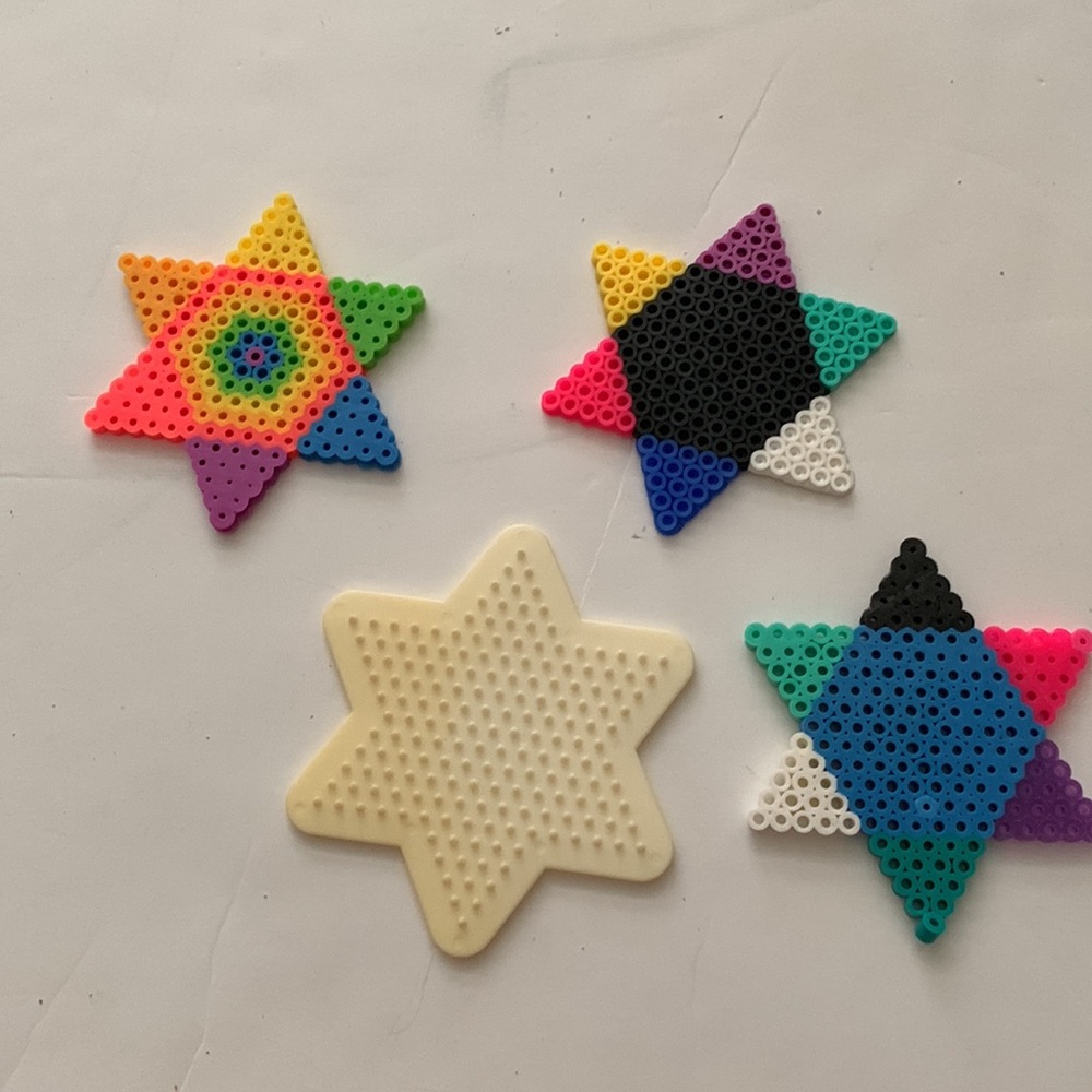 Perler bead stars and pegboard